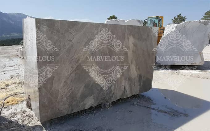 import of rough marble blocks